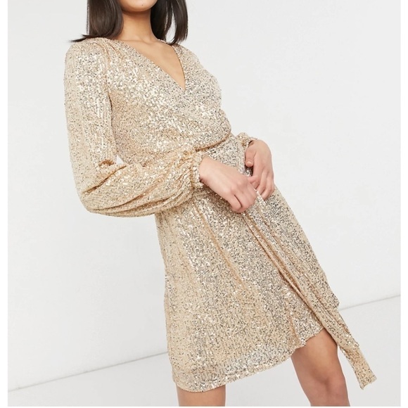 SEQUIN WRAP TIE FRONT MINI DRESS IN GOLD
Dress by Urban Threads - Picture 1 of 5
